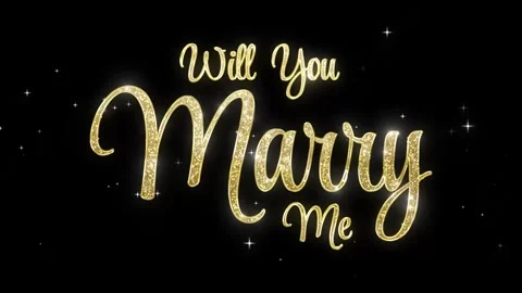 Golden Glitter Text Display Saying Will You Marry Me on Black Background Stock Footage 325950239