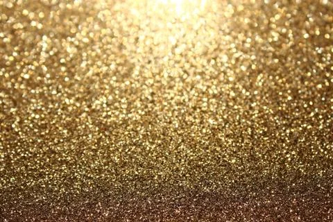 Golden glittering background Stock Photos