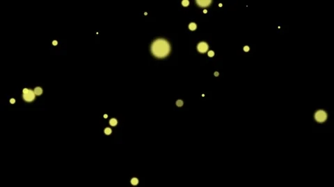 Golden glowing light particles animation falling randomly on black background. Stock Footage 324240771