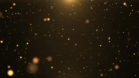 Golden glowing particles floating in dark space creating a warm sparkling atm 库存影片 330593467