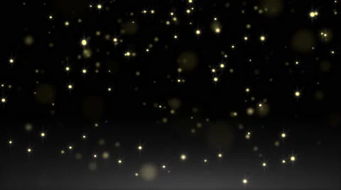 Golden glowing star particle in random direction with bounce on spotlight gro Stock Footage 64860044