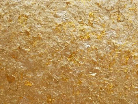 Golden gold leaf texture background. Shiny textured gold foil surface Stock Photos