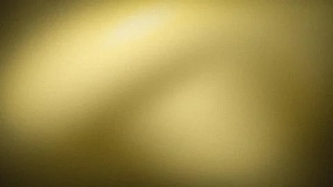 Golden grainy abstract gradient background with soft blur and grunge textur.. Stock Photos