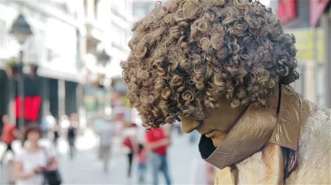Golden guy in the street Stock Footage 65768157