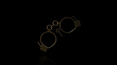Golden Handcuffs turn on itself - loop animation Video stock 253351269