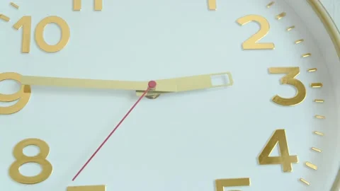 Golden hands of wall clock are moving slowly on a white face. Stock Footage 270466813