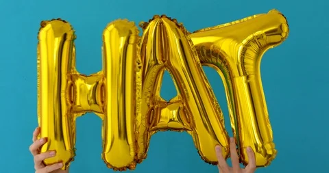 Golden HAT word made of inflatable balloons Stock Footage 113458040
