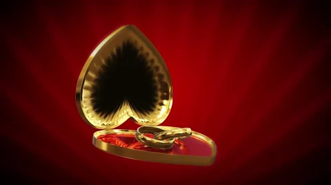 Golden heart shaped Box with wedding rings Stock-Footage 59381739