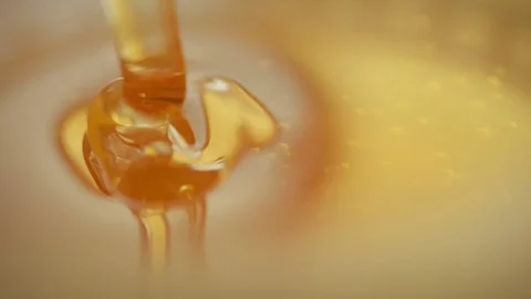 Golden honey close-up Stock Footage 80344254