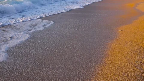 Golden hour on the beach durring summer Stock Footage 168989526