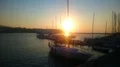 Golden hour, beautiful view of white yachts floating on river, relaxation HD Footage
