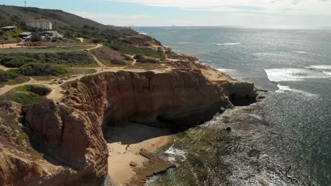 Golden Hour Cliffs and Tracking Birds Stockbeeldmateriaal 221379165