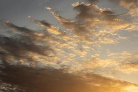Golden Hour Clouds in the Sky Фото