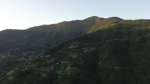 Golden hour drone flight over mountain peaks, Adjara Stock Footage 343466205