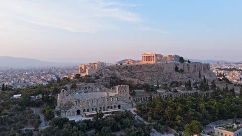 Golden Hour Drone Flyover of Acropolis of Athens and Odeon of Herodes Atticus Video stock 341473490