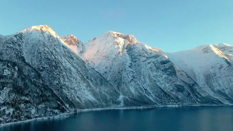 Golden Hour at Eresfjord or Eikesdalen, Norway - Aerial View of Snow Capped Moun Stock Footage 315503879