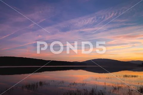 Golden hour landscape in Studena dam. Water level is restored in 2020 after been Stock Photos