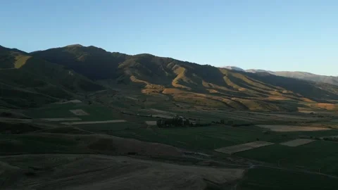 Golden hour light moving across Kyrgyzstan Chong Kemin valley Stock Footage 345213007