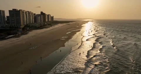 Golden Hour Ocean Sunset at the Beach in Sao Luis - Aerial Dolly In Stock Footage 309755809