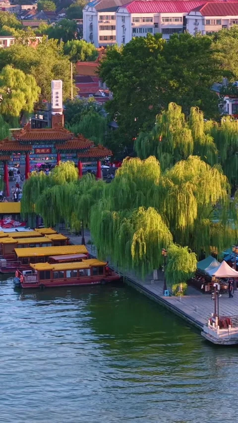 Golden Hour Over Daming Lake with Traditional Boats in Jinan Stock Footage 331119081