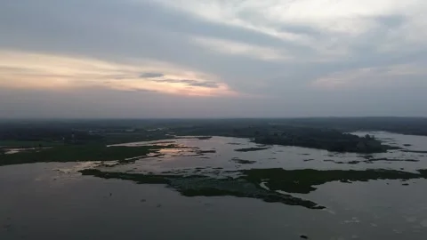 Golden Hour Reflection Over Remote Reservoir Stock Footage 313926260