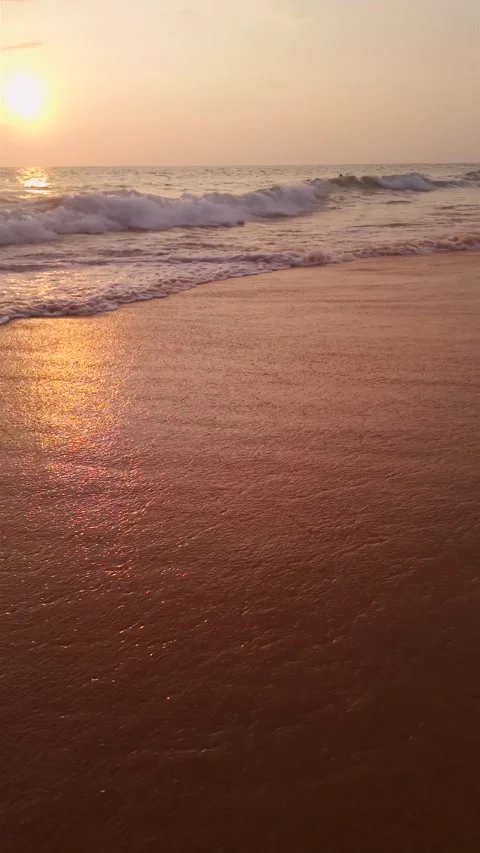 Golden Hour Slow Motion Reflections On Wet Beach Sand At Hikkaduwa Sri Lanka Stock Footage 329164702