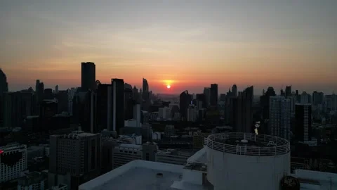 Golden Hour Sun Setting Behind Bangkok Skyline, Thailand Stock Footage 335256276