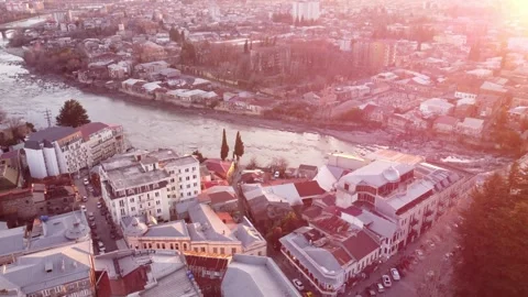Golden hour sunset with aerial view in Kutaisi, Georgia Stock Footage 297200053