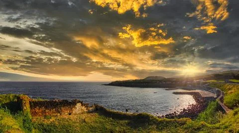 Golden Hour Sunset on Cloudscape Over Ocean Bay Azores Portugal Stock Photos