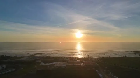 Golden Hour Sunset Over Waves and Clouds in Viana do Castelo 스톡 동영상 345101943