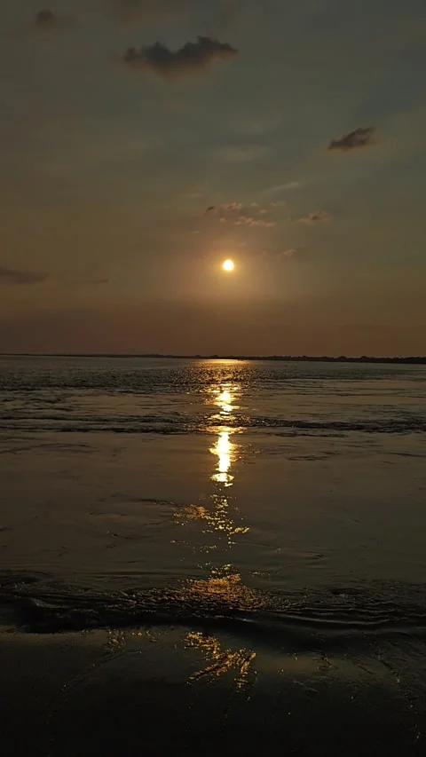 Golden Hour Sunset Reflection on Moving River Water 4K Vertical Footage Stock Footage 340518329