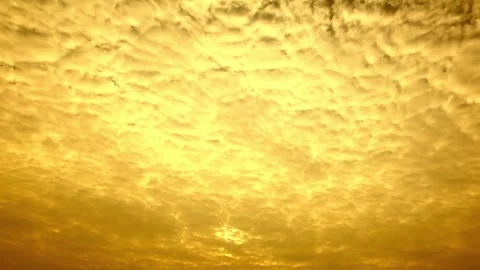Golden Hour Sunset Sky with Dramatic Cloud Formations Stock Footage 310921633