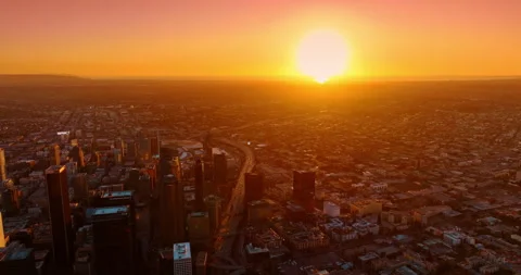 Golden hour time over the panorama of Los Angeles, California, USA. Bright sun Stock Footage 330306747