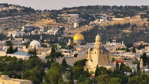 Golden hour view of Dormition Abbey and Dome of the Rock in Jerusalem Stock Footage 341507959