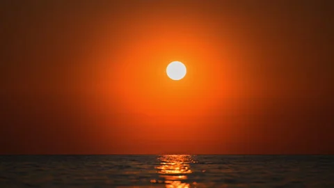 Golden hour waves and clear sky on the Italian coast Stock Footage 325990819