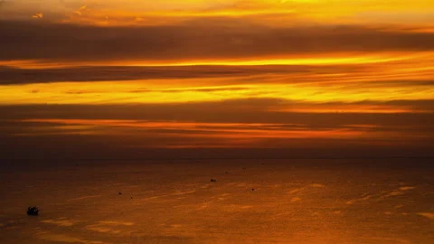 A Golden Idyllic Sunset. The Sun Sets Into The Waters of The Gentle Ocean Stock Footage 244763362