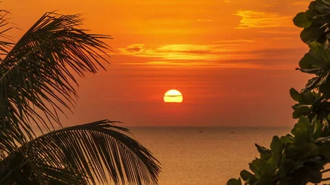 A Golden Idyllic Sunset. The Sun Sets Into The Waters of The Gentle Ocean Stock Footage 268413117