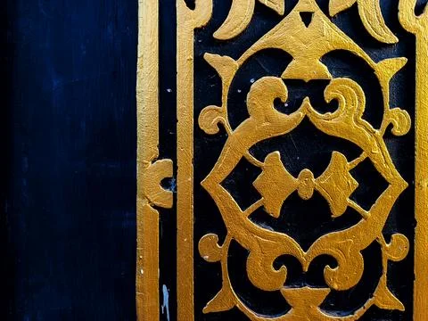 Golden Islamic Geometric Pattern on Blue Decorative Mosque Wall Stock Photos