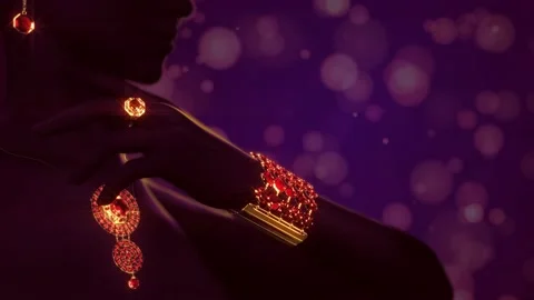 Golden jewellery set with red ruby gem stones, ring collar wristlet and shackle Stock Footage 194267364