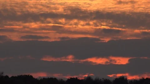 Golden light and time lapse clouds in the evening light UK 4K 스톡 동영상 119853239