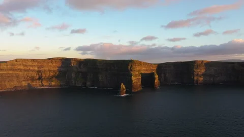 Golden Light Bathes Cliffs of Moher in Ireland&amp;#039;s Coastal Beauty Stock Footage 331825080