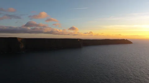 Golden Light Bathes Cliffs of Moher in Ireland&amp;#039;s Coastal Beauty Stock Footage 331825206