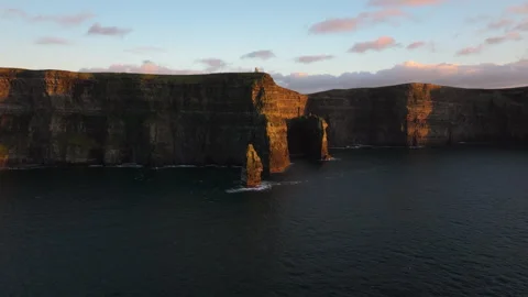 Golden Light Bathes Cliffs of Moher in Ireland&amp;#039;s Coastal Beauty Stock Footage 331825972