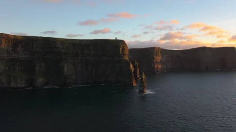 Golden Light Bathes Cliffs of Moher in Ireland&amp;#039;s Coastal Beauty Stock Footage 331826480