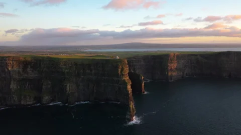 Golden Light Bathes Cliffs of Moher in Ireland&amp;#039;s Coastal Beauty Stock Footage 331826577