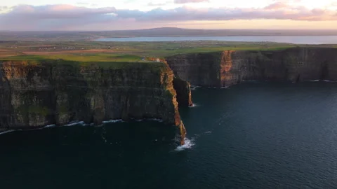Golden Light Bathes Cliffs of Moher in Ireland&amp;#039;s Coastal Beauty Stock Footage 331826760