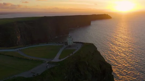 Golden Light Bathes Cliffs of Moher in Ireland&amp;#039;s Coastal Beauty Stock Footage 331827046
