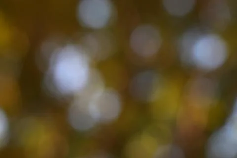 Golden light bokeh pattern soft focus background texture Stock Photos