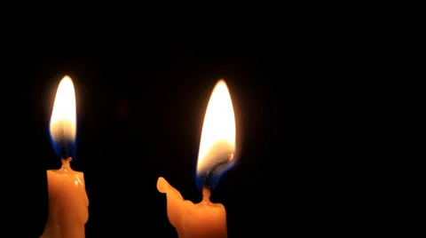 Golden light of candle flame Stock Footage 24960573