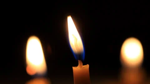 Golden light of candle flame Stock Footage 27092693